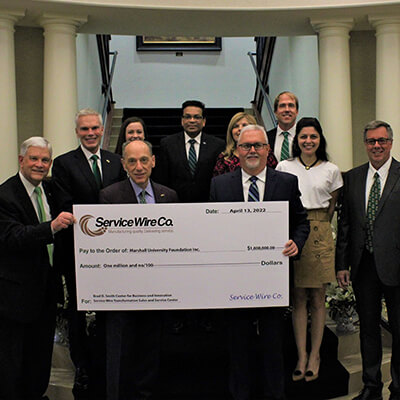 Service Wire Co with Marshall University Donating to Business School